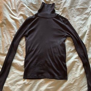 Black Everlane turtleneck: The Pima Micro-Rib Turtleneck